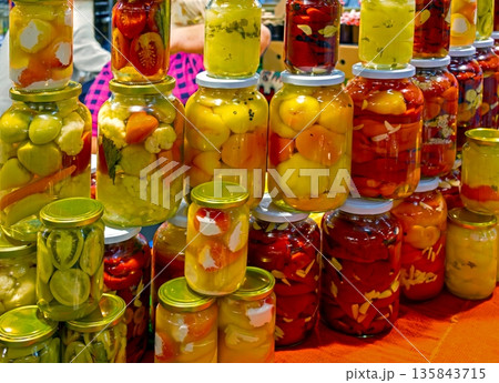 Fermented vegetables in glass jars Fermented vegetables in glass jars 135843715