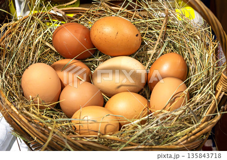 Organic fresh eggs in basket Organic fresh eggs in basket 135843718