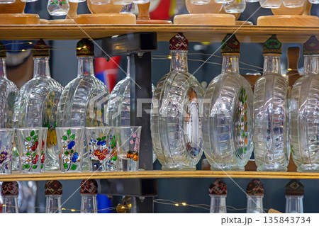 Traditional brandy empty bottles 135843734
