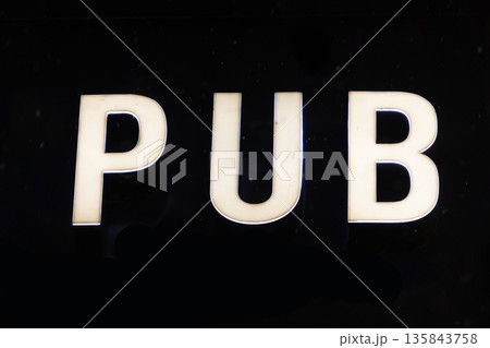 Pub sign on building facade Pub sign on building facade 135843758