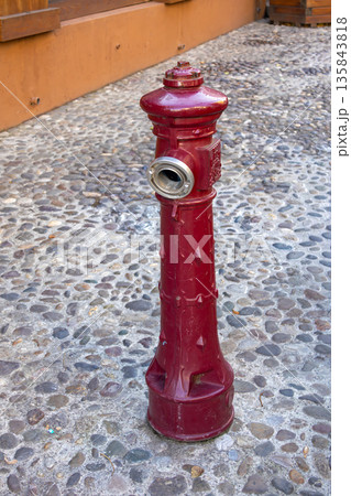 Red water hydrant street Red water hydrant street 135843818