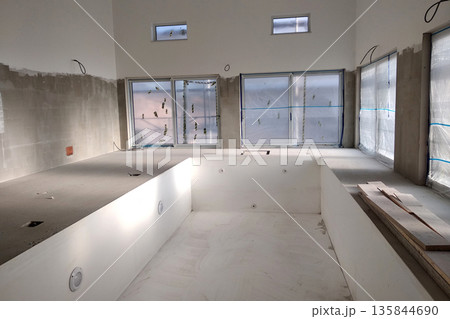 Interior of a house with big swimmig pool under renovation works. 135844690