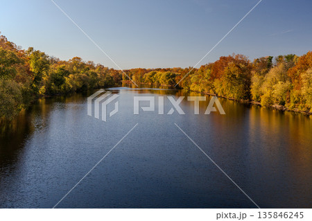A river with trees on both sides A river with trees on both sides 135846245