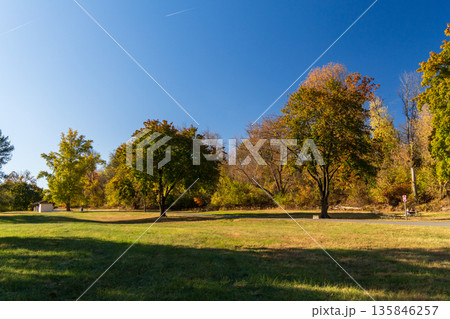 Valley Forge park with a bench and a sign 135846257
