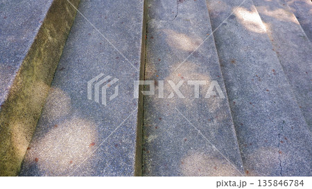 Diagonal View of Outdoor Stone Steps and Shadows 135846784
