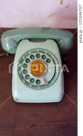 Top View of Vintage Green Rotary Dial Telephone Top View of Vintage Green Rotary Dial Telephone 135846787