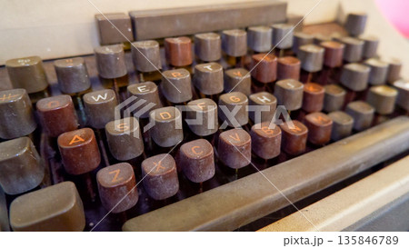 Close Up of Vintage Typewriter Keys with Brown Finish Close Up of Vintage Typewriter Keys with Brown Finish 135846789