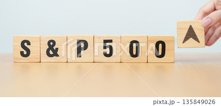 Hand change wooden block of SP500 text to UP and Down arrow symbol icon. stock market index, trade, trade company in the United States, financial growth and Cut loss concept 135849026