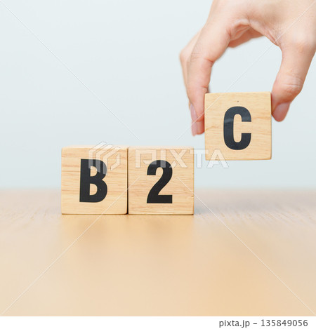 hand change wooden block from B2C. Business to Customer, ECommerce, Marketplace, marketing, Logistics and technology concept hand change wooden block from B2C. Business to Customer, ECommerce, Marketplace, marketing, Logistics and technology concept 135849056
