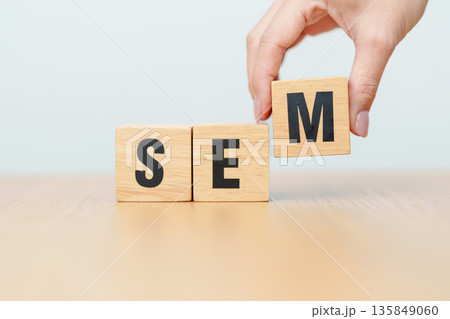 Wooden block of SEM. Search Engine Optimization, SEA, SEO, Advertising, Marketing, Idea, Strategy, Keyword, Content and technology concept 135849060