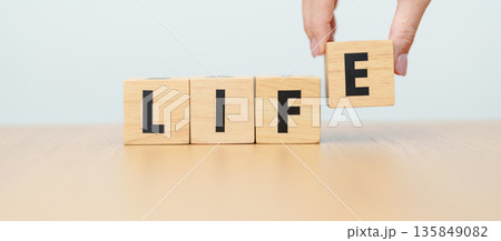 hand change wooden block Live to Life. Lifestyle, Live your life, learning, motivation and mindset concepts hand change wooden block Live to Life. Lifestyle, Live your life, learning, motivation and mindset concepts 135849082