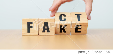 hand change wooden block FAKE to FACT. rumor News, false, myth, evidence and disinformation concepts hand change wooden block FAKE to FACT. rumor News, false, myth, evidence and disinformation concepts 135849090