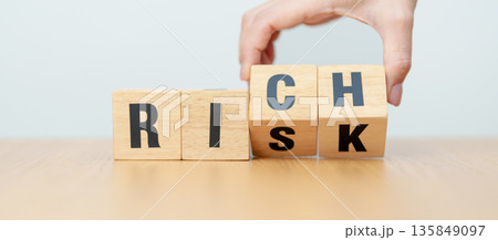 hand change wooden block Risk to Rich. High Risk High Return, strategy, analysis, marketing, risk management, wealth, opportunity and Crisis concepts hand change wooden block Risk to Rich. High Risk High Return, strategy, analysis, marketing, risk management, wealth, opportunity and Crisis concepts 135849097