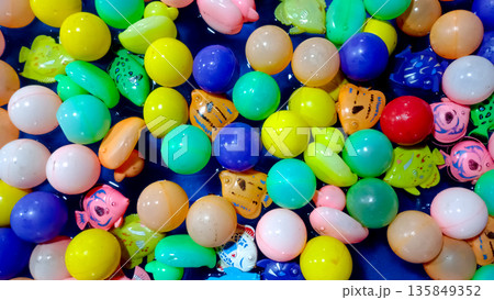 Top View Pattern of Vibrant Plastic Balls and Toy Fish for Children Play Area Top View Pattern of Vibrant Plastic Balls and Toy Fish for Children Play Area 135849352