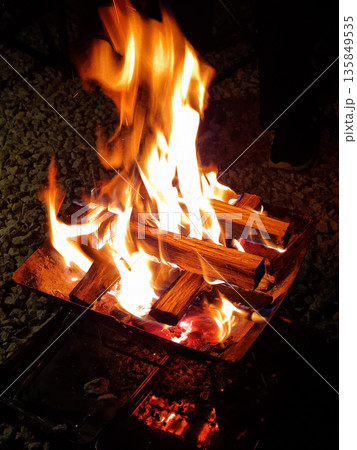 It is a flame rising from a bonfire. It is a flame rising from a bonfire. 135849535