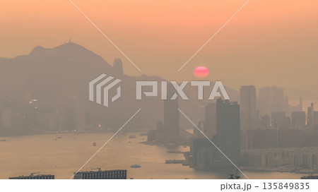 Jan 18 2026 Sunset over Victoria Harbour looking at Tsim Sha Tsui. Jan 18 2026 Sunset over Victoria Harbour looking at Tsim Sha Tsui. 135849835