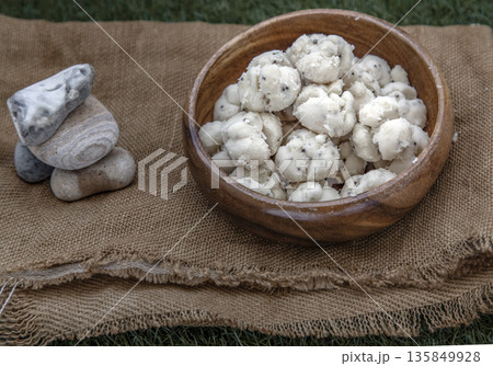 Thai Shortbread Cookies (Thai Dessert), Kanom Kleeb Lum Duen on burlap fabric background. 135849928