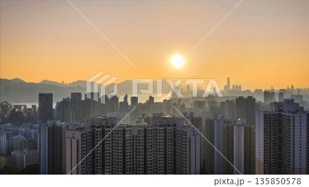 Jan 18 2026 Hong Kong island sunset over Kowloon harbour. 135850578