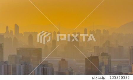 Jan 18 2026 Hazy polluted air drifting across Kowloon urban skyline 135850583