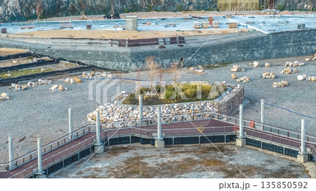 Jan 18 2026 Modern flood retention basin in green suburban park. Jan 18 2026 Modern flood retention basin in green suburban park. 135850592