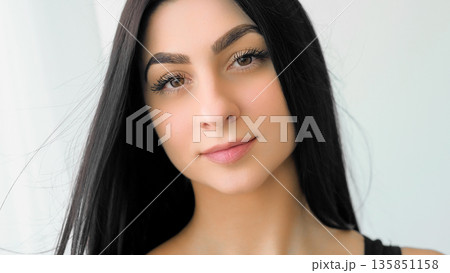 Pretty woman face. Confident model. Beautiful girl with long healthy hair casual makeup. Attractive female isolated on white background. Pretty woman face. Confident model. Beautiful girl with long healthy hair casual makeup. Attractive female isolated on white background. 135851158