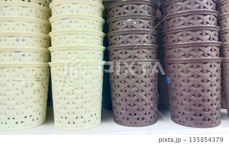 Neutral Tone Woven Plastic Storage Baskets in White and Brown 135854379