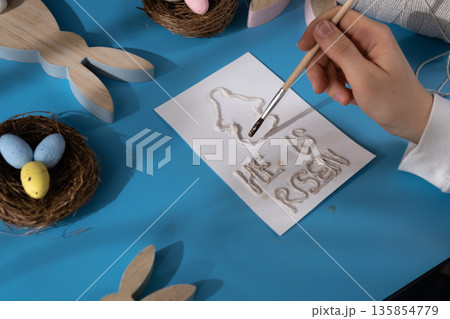 Painting Easter angel CHRIST IS RISEN phrase Gift Easter idea. Do it yourself instruction postcard eco-friendly decoration. Making handmade art presents children's diy projects. Spring holiday family 135854779