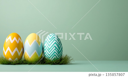 Colorful Easter Eggs on Soft Green Surface with Grass Decoration for Spring Celebration Colorful Easter Eggs on Soft Green Surface with Grass Decoration for Spring Celebration 135857807