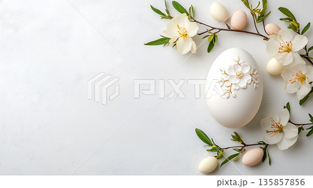 Elegant White Egg with Floral Design Surrounded by Spring Blossoms and Small Eggs 135857856