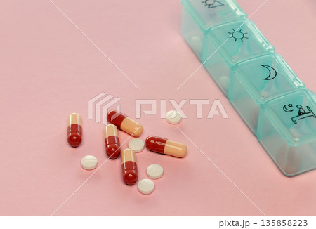 pill set box on table for daily medication 135858223