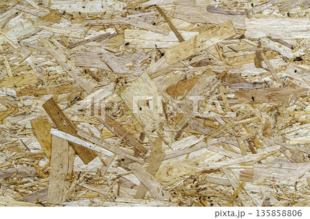 OSB Wood Texture Background with Compressed Strand Pattern. High quality photo OSB Wood Texture Background with Compressed Strand Pattern. High quality photo 135858806