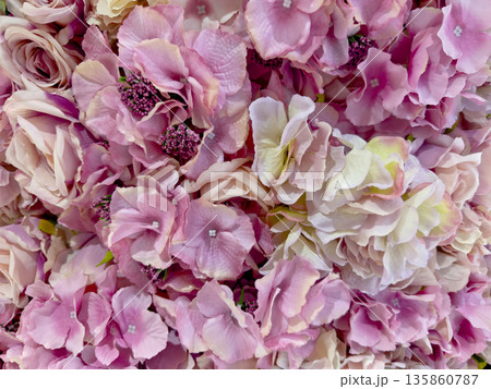 Floral wall decoration of pink and white artificial roses flowers Floral wall decoration of pink and white artificial roses flowers 135860787