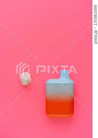 Disposable vape device with gum piece on pink background, minimal concept 135861000