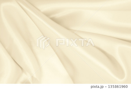 Smooth elegant golden silk or satin luxury cloth texture as wedding background. Luxurious background design. In Sepia toned. Retro style Smooth elegant golden silk or satin luxury cloth texture as wedding background. Luxurious background design. In Sepia toned. Retro style 135861960