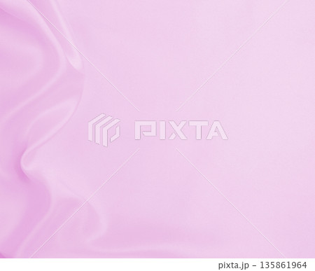 Smooth elegant pink silk or satin texture as wedding background. Luxurious background design 135861964
