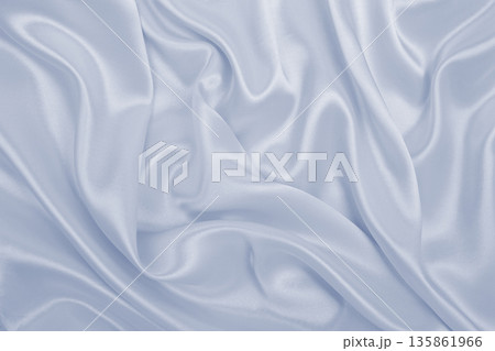 Smooth elegant grey silk or satin luxury cloth as wedding background. Luxurious background design Smooth elegant grey silk or satin luxury cloth as wedding background. Luxurious background design 135861966