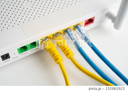 Ethernet cable with wireless router connect to internet service provider internet network. 135862923