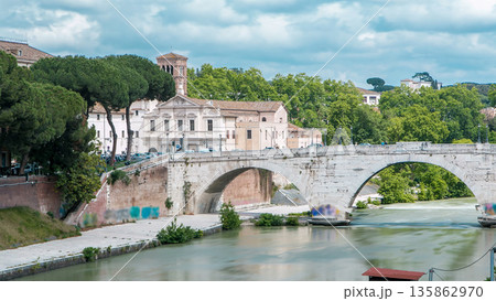 isola tiberina timelapse is the biggest island of tibera river in rome. isola tiberina timelapse is the biggest island of tibera river in rome. 135862970