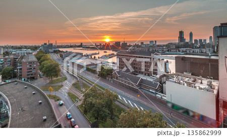 Aerial panoramic view over Maashaven timelapse at sunset in Rotterdam. Aerial panoramic view over Maashaven timelapse at sunset in Rotterdam. 135862999