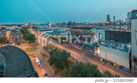 Aerial panoramic view over towers in Maashaven night to day timelapse in Rotterdam Aerial panoramic view over towers in Maashaven night to day timelapse in Rotterdam 135863000