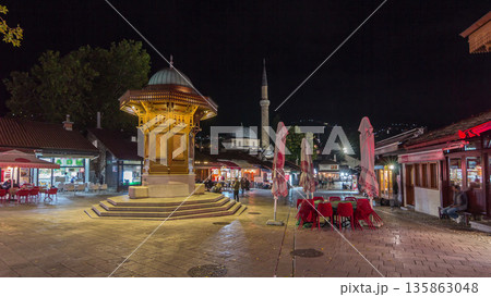 The Sebilj fountain in Sarajevo old city in Bosnia and Herzegovina night timelapse hyperlapse. 135863048