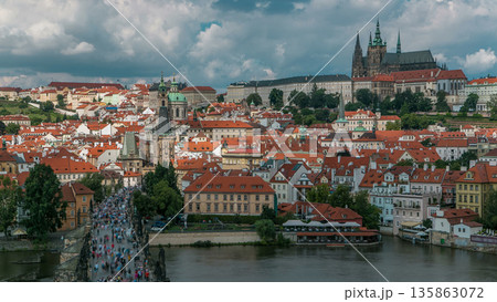 Charles Bridge and Prague Castle timelapse, view from the Bridge tower, Czech Republic Charles Bridge and Prague Castle timelapse, view from the Bridge tower, Czech Republic 135863072