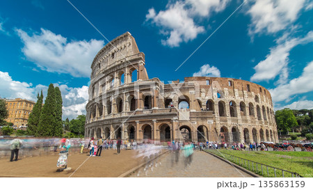 The Colosseum or Coliseum timelapse hyperlapse, also known as the Flavian Amphitheatre in Rome, Italy The Colosseum or Coliseum timelapse hyperlapse, also known as the Flavian Amphitheatre in Rome, Italy 135863159