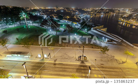 Jardim do Morro in Vila Nova de Gaia and Porto cityscape night timelapse in Portugal, historic city centre. 135863237