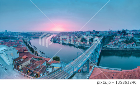 Day to night view of the historic city of Porto, Portugal timelapse with the Dom Luiz bridge Day to night view of the historic city of Porto, Portugal timelapse with the Dom Luiz bridge 135863240
