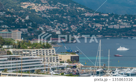 Monte Carlo city aerial panorama timelapse. View of luxury yachts and apartments in harbor of Monaco, Cote d'Azur. Monte Carlo city aerial panorama timelapse. View of luxury yachts and apartments in harbor of Monaco, Cote d'Azur. 135863310