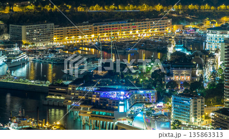 Aerial top view of Monaco from the grand corniche road night timelapse, Monaco France Aerial top view of Monaco from the grand corniche road night timelapse, Monaco France 135863313