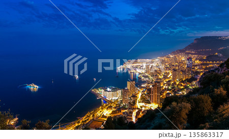 Aerial top view of Monaco from the grand corniche road day to night timelapse, Monaco France Aerial top view of Monaco from the grand corniche road day to night timelapse, Monaco France 135863317