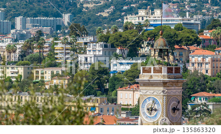 Bright sun lights red roofs of the old city timelapse. Aerial view from Shatto's hill. Nice, France 135863320