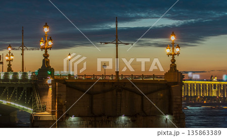 Opening Trinity bridge timelapse and pleasure boats are on Neva river in Saint-Petersburg, Russia. Opening Trinity bridge timelapse and pleasure boats are on Neva river in Saint-Petersburg, Russia. 135863389